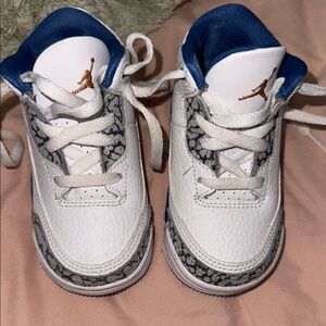 Jordan White and Blue Sneakers with Iconic Design